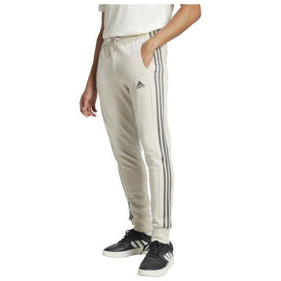 Adidas Ανδρικό παντελόνι φόρμας Essentials French Terry Tapered Cuff 3-Stripes Joggers Adidas Ανδρικό παντελόνι φόρμας Essentials French Terry Tapered Cuff 3-Stripes Joggers